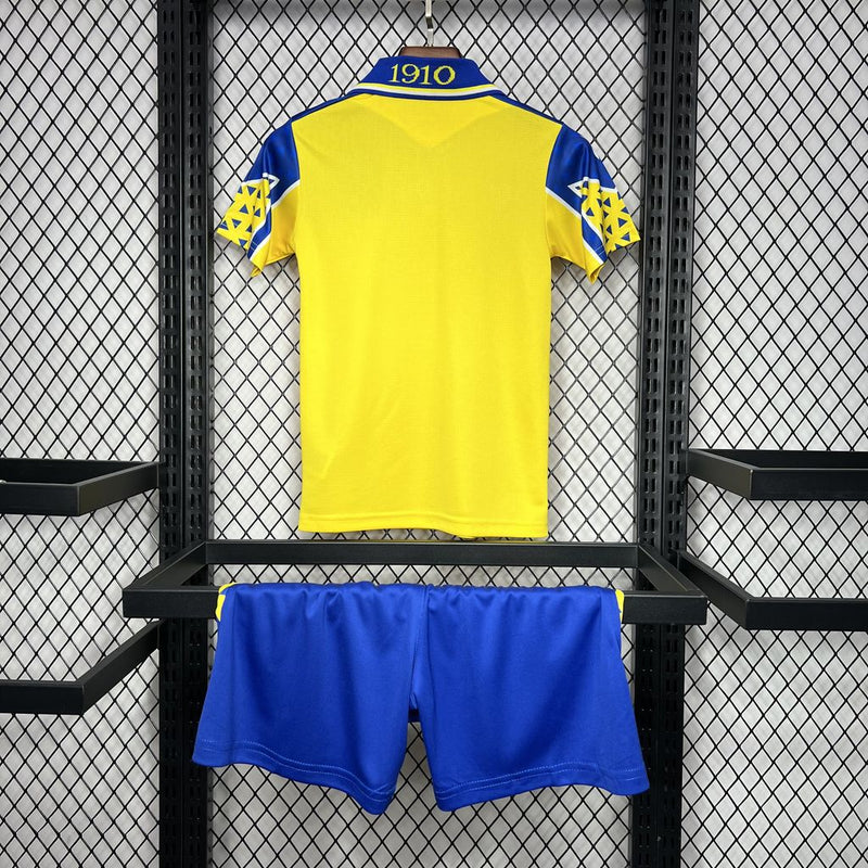 Kit Infantil Cádiz Home 24/25 Unissex Macron - Amarelo e Azul